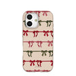 Seashell Holiday Bows iPhone 17 Case