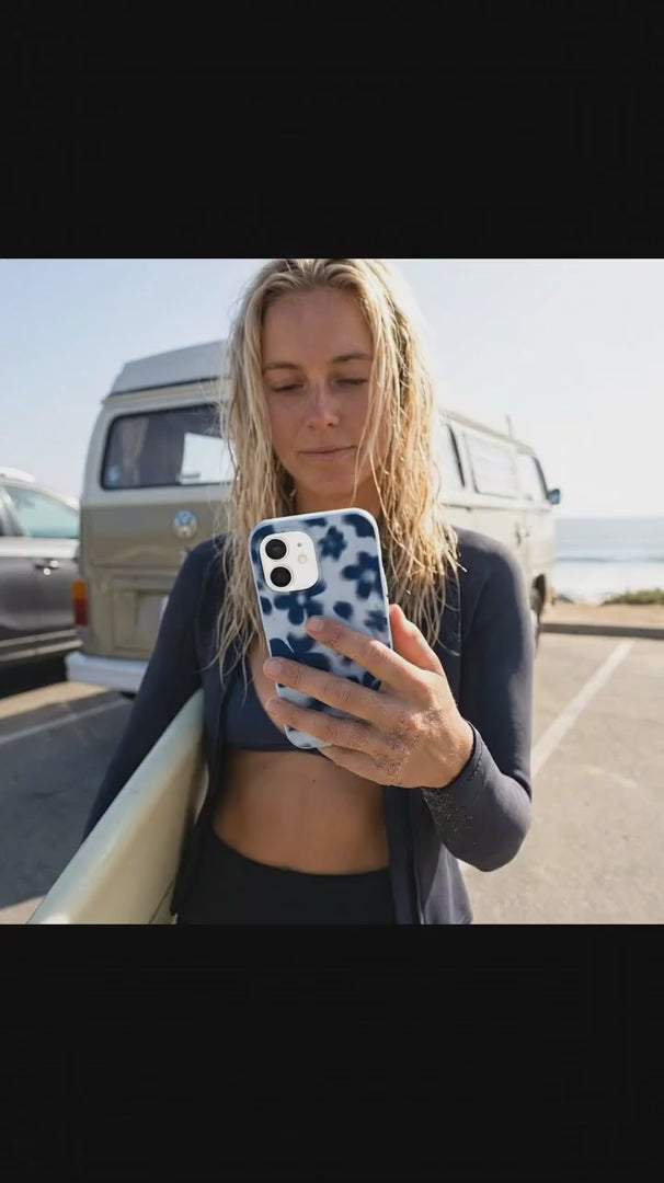 Powder Blue Hazy Daisies iPhone 15 Case - Product video demonstration